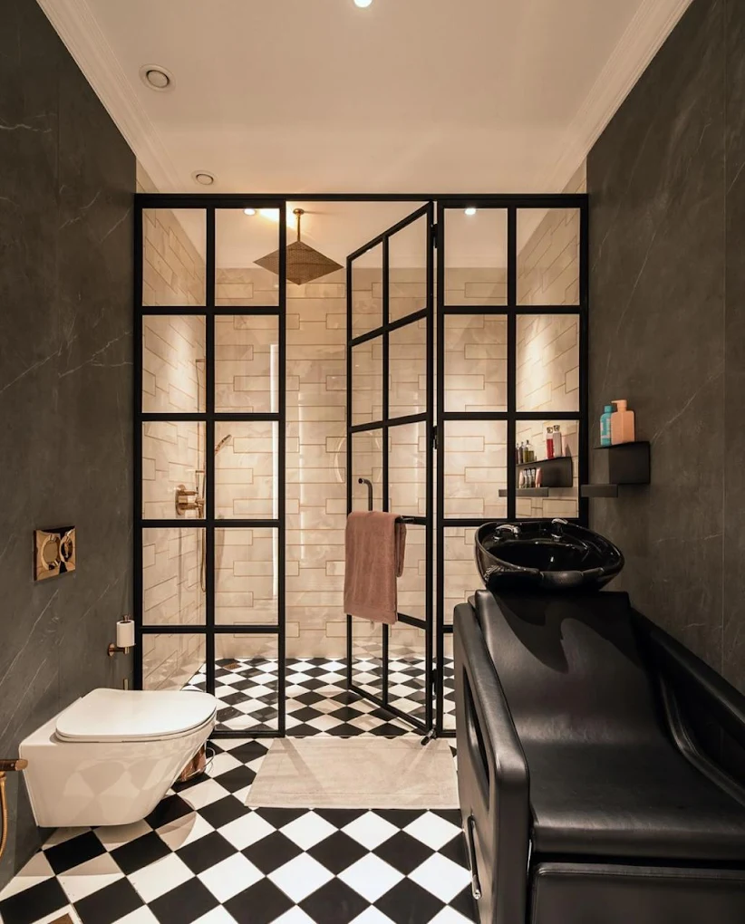 Modern frameless toughened glass shower enclosure installation by Mira Glass